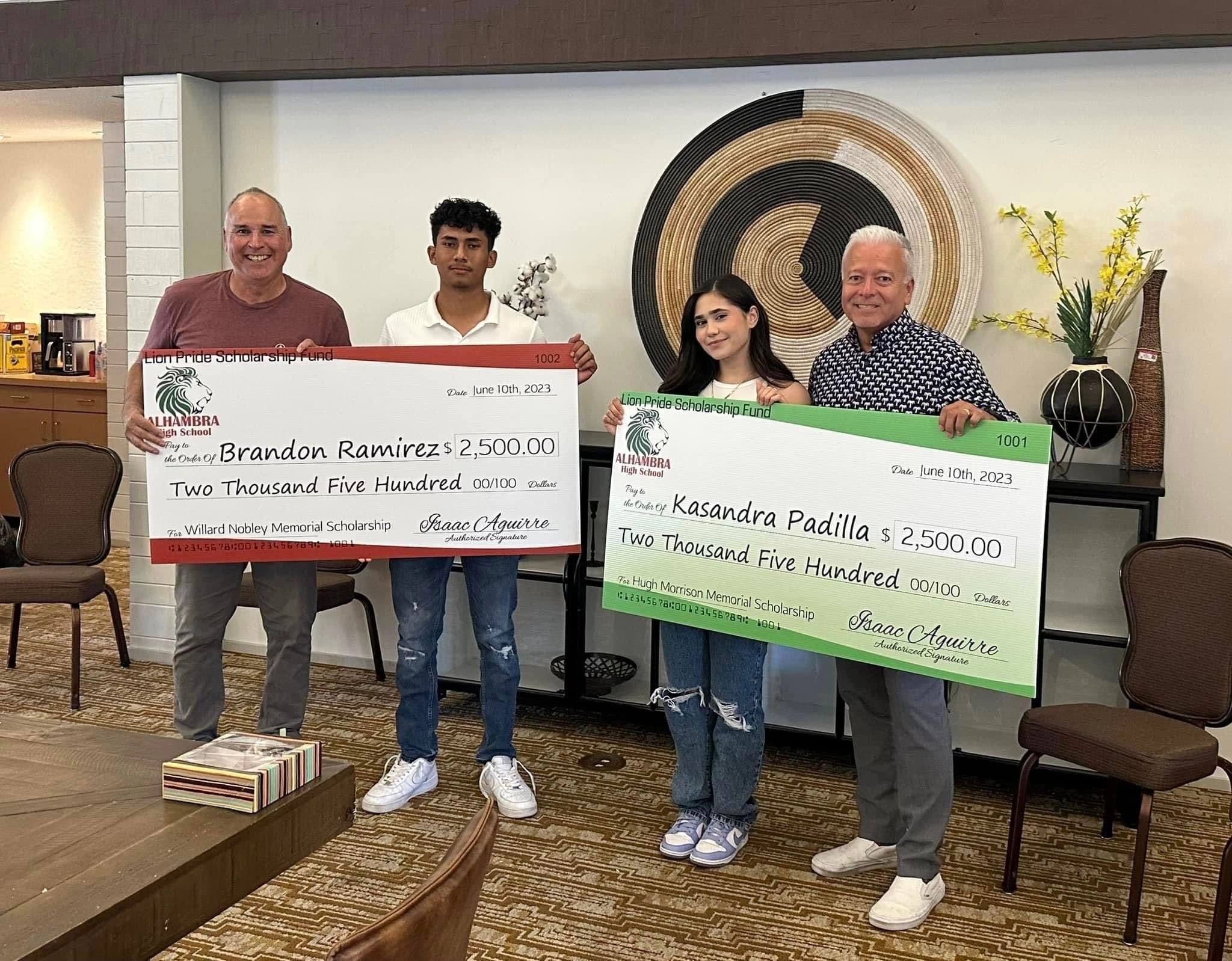 Brandon Ramirez and Kasandra Padilla with their 2023 Lion Pride Scholarship Fund cheques